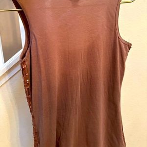 Eddie Bauer in a dusty pink rose sequin top.